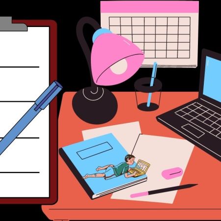 aesthetic desk with notebook, laptop, and test taking checklist